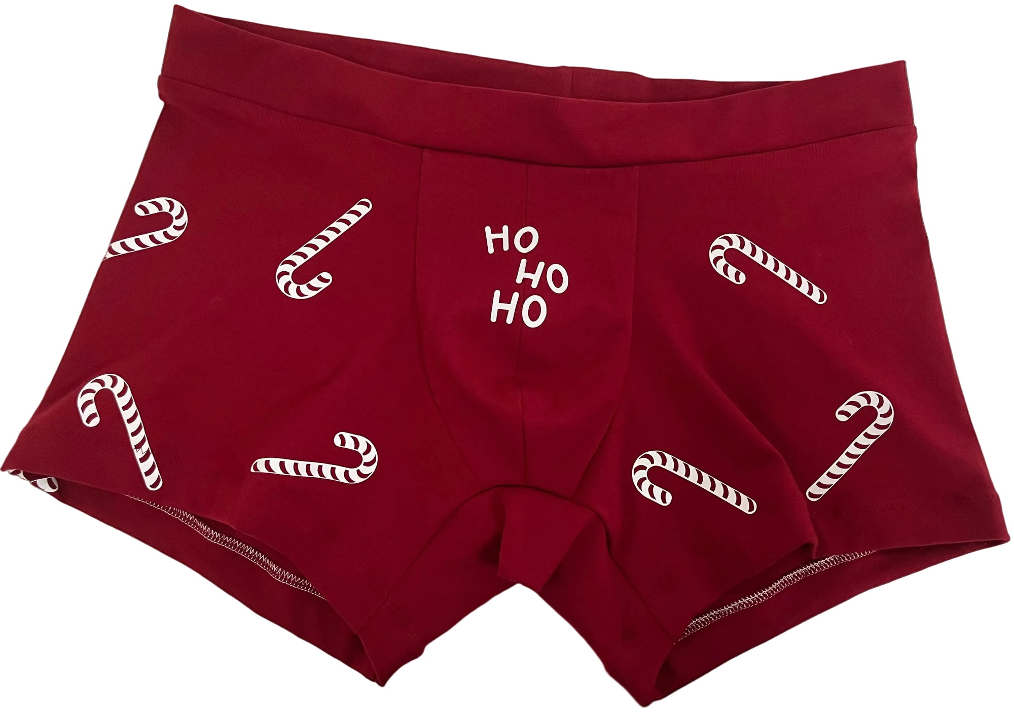 Knallrote Herren-Unterhose mit Zuckerstangen-Aufdruck und dem typischen Nikolaus-Spruch "Ho-ho-ho"