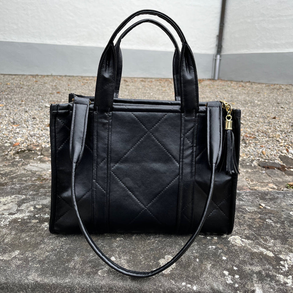 Schwarze Kunstledertasche mit Handträger und Schulterschlaufe