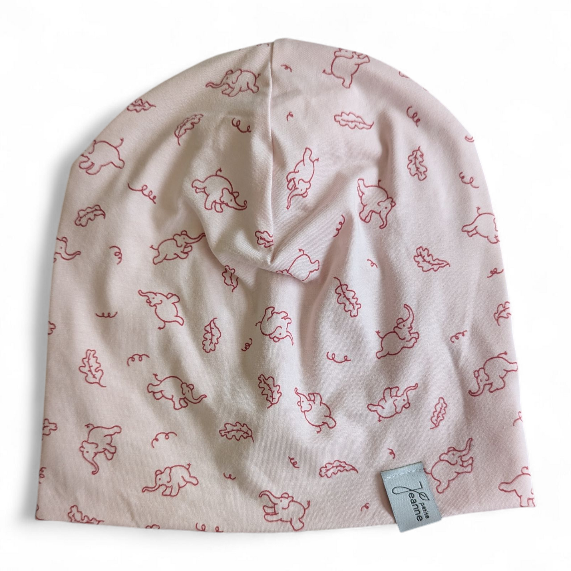 Hellrosa Kinderbeanie mit kleinen Elefanten und Blättern 