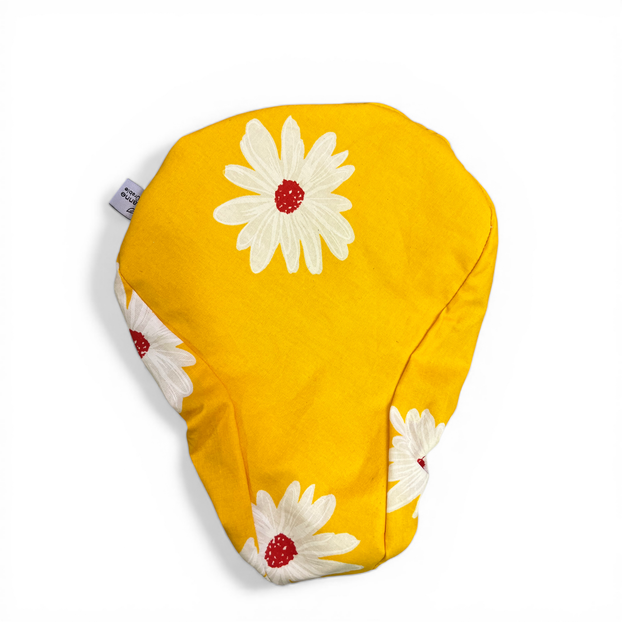 Fahrradsattelbezug aus einem beschichteten Tischtuch. Leuchtend gelb mit Margeriten.